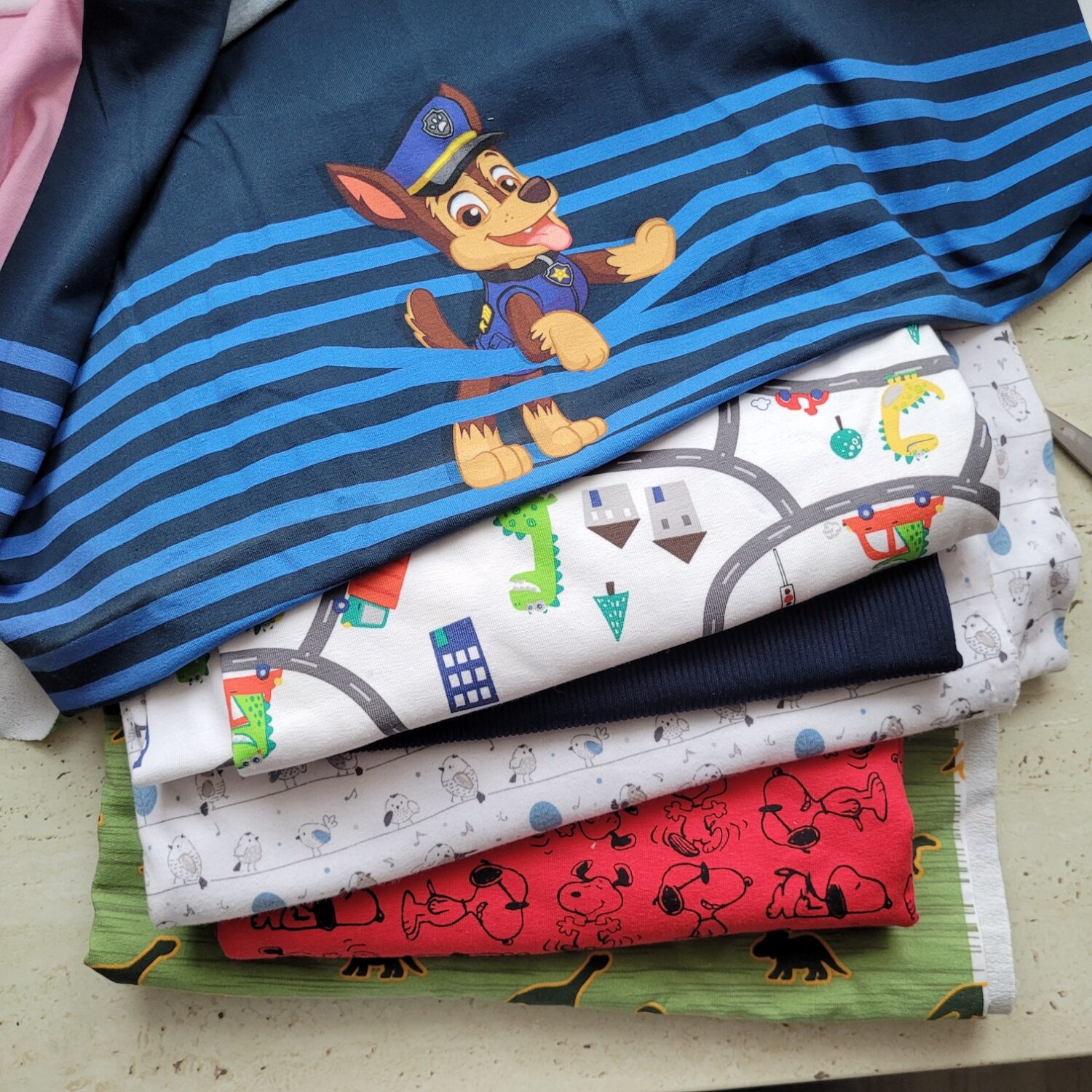 zbytkové balíčky látek kluk